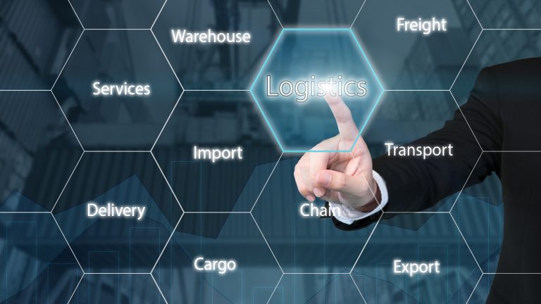 Business technology concept - Business man touching the logistics icon with business success virtual screen use for import,export,logistics background.
